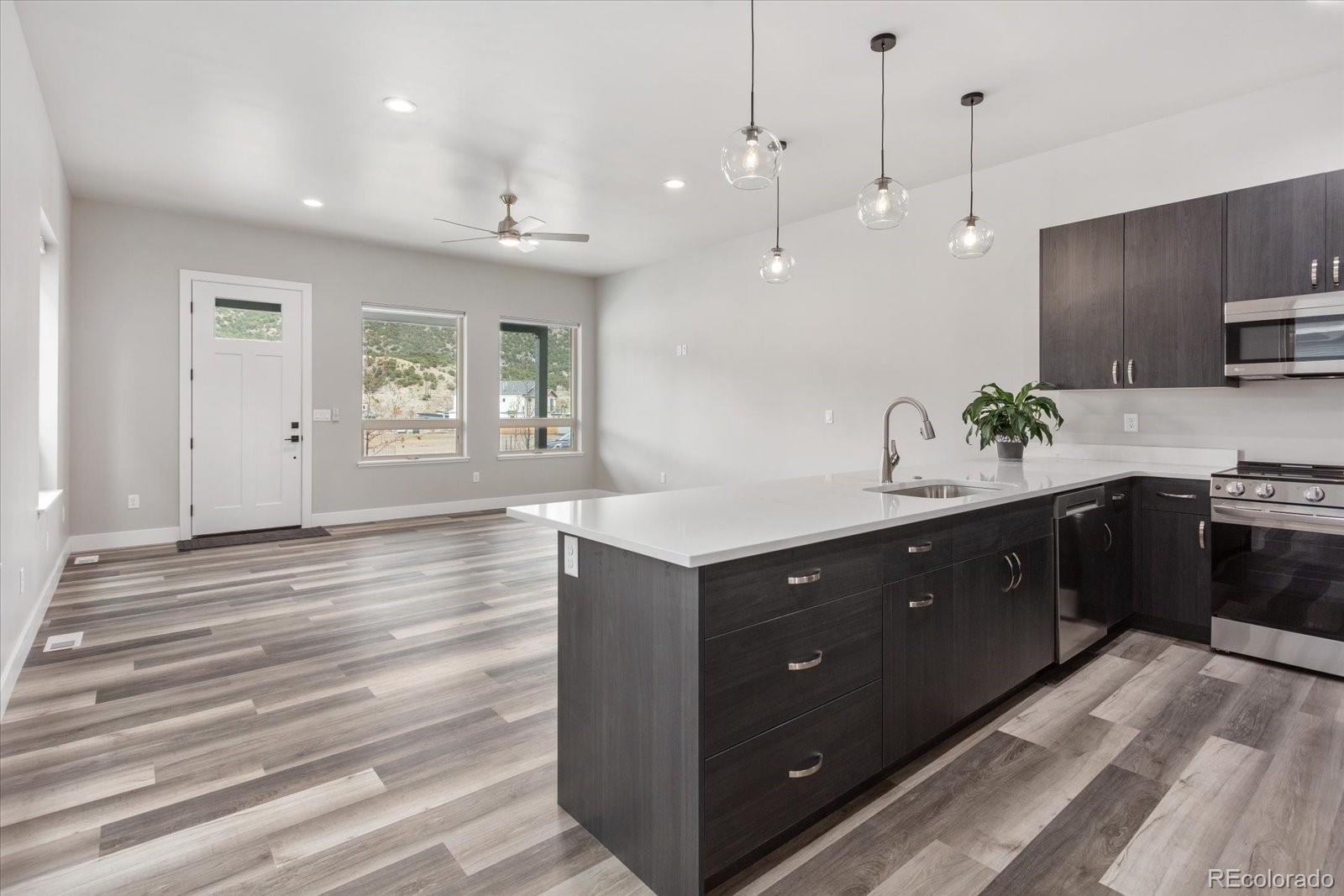 126 Southside Loop Salida, CO 81201 - Photo 10 of 29 a spacious bathroom with a sink double vanity granite and a shower