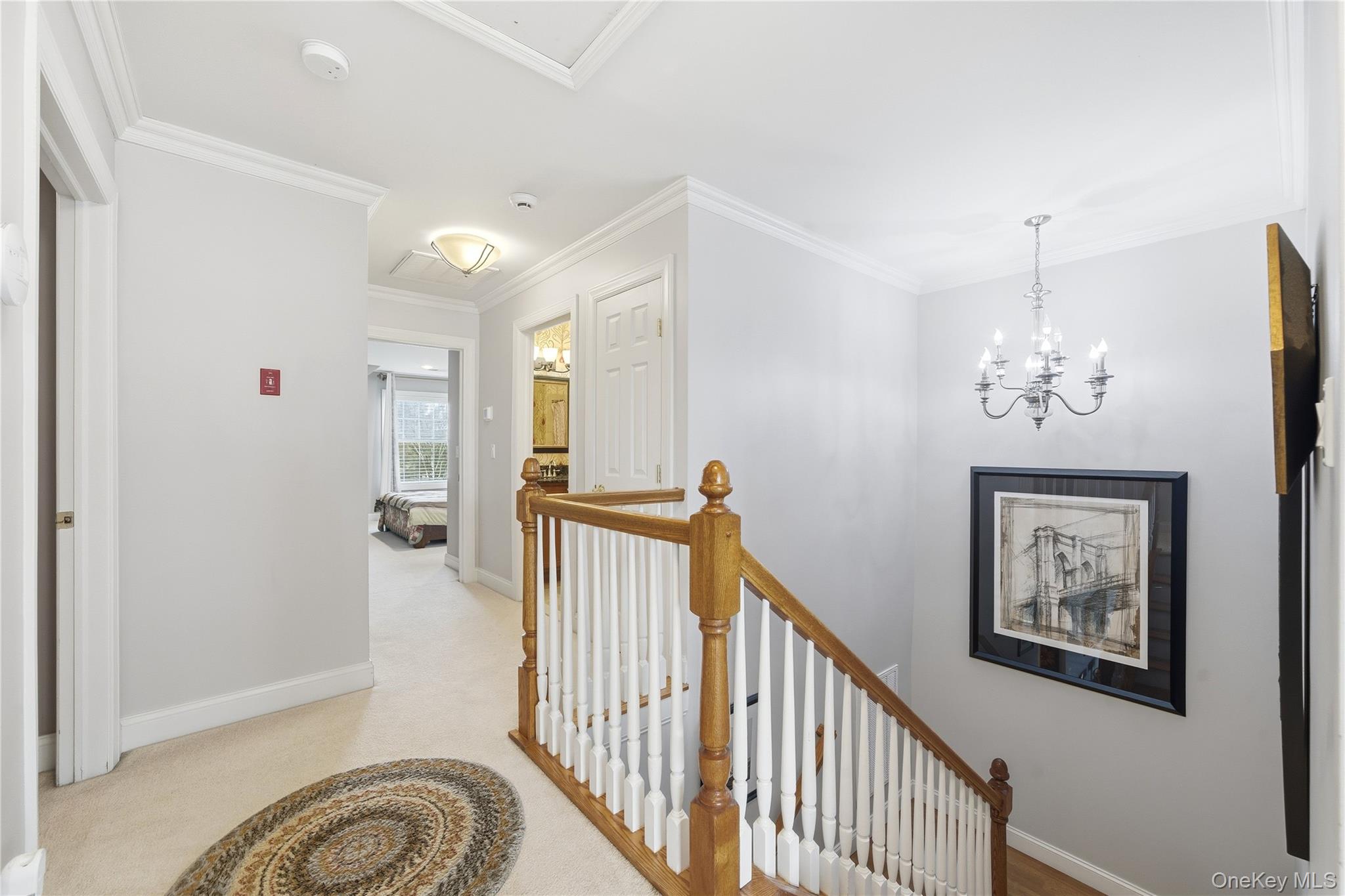 307 Medea Way Central Islip, NY 11722 - Photo 17 of 33 a view of a hallway with a mirror