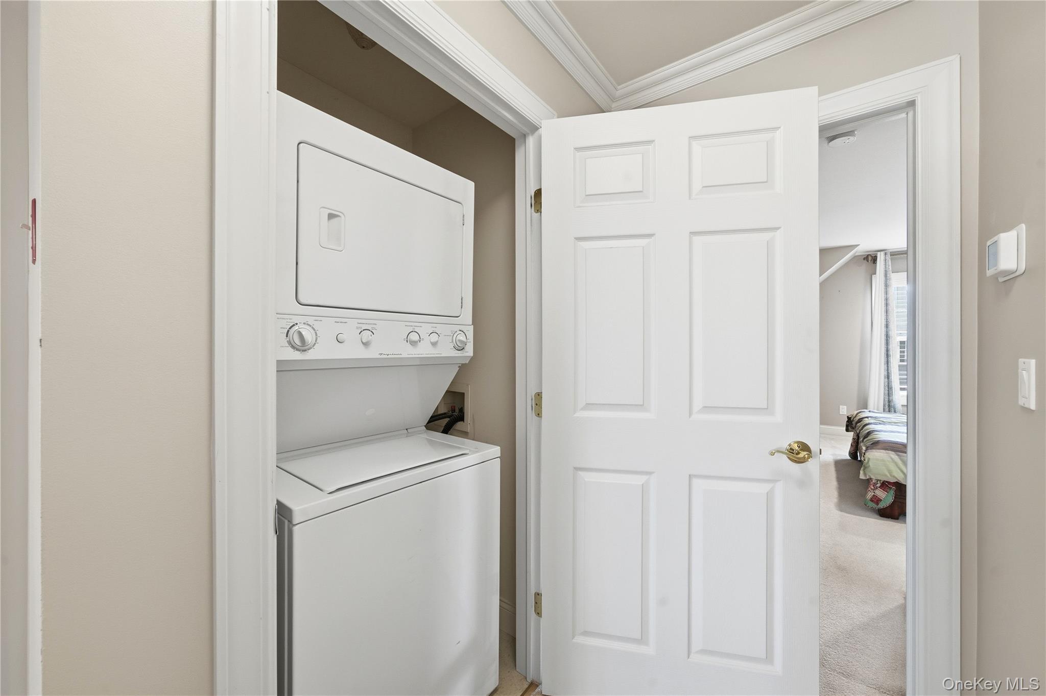 307 Medea Way Central Islip, NY 11722 - Photo 19 of 33 a utility room with dryer and washer