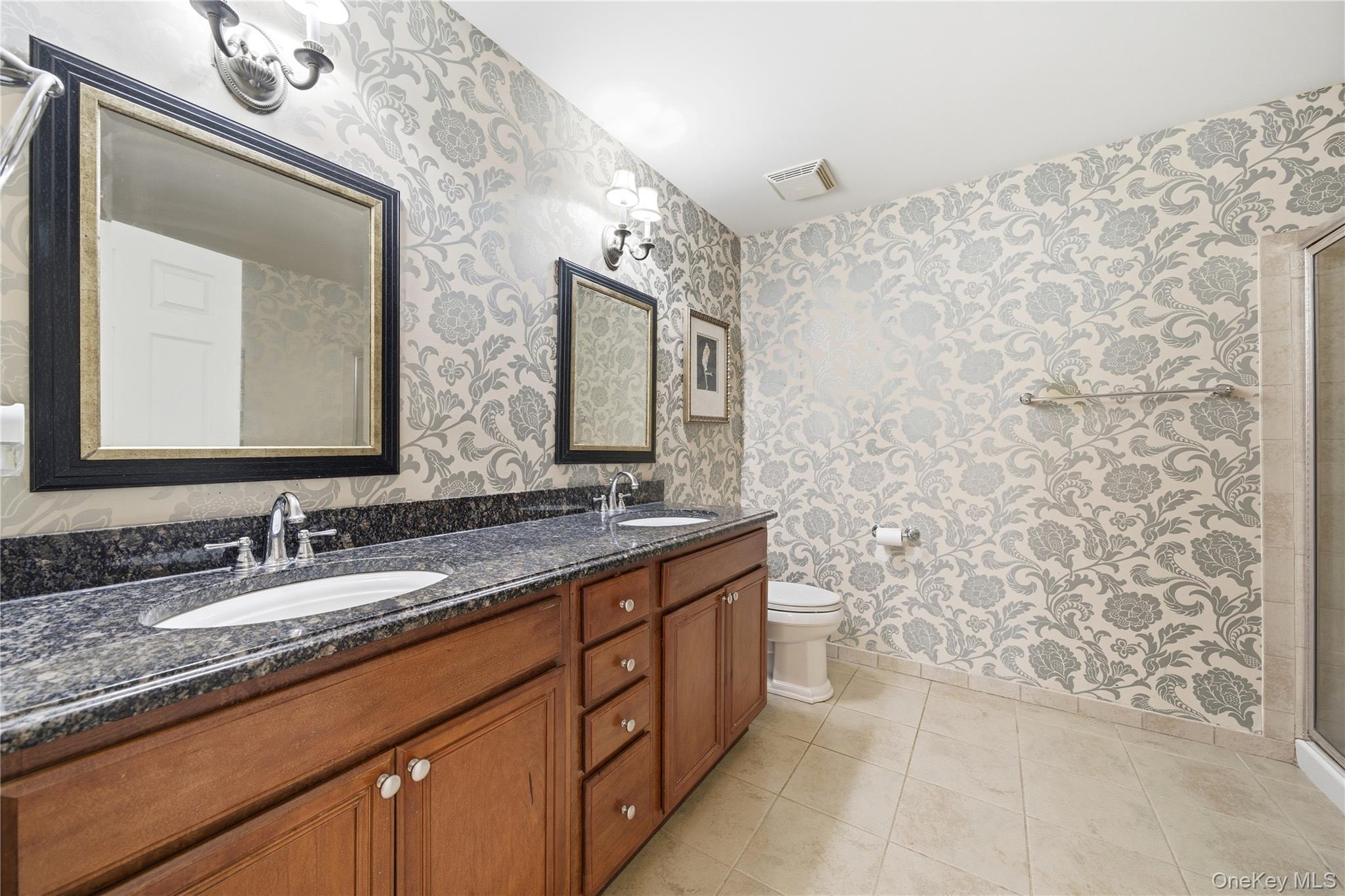 307 Medea Way Central Islip, NY 11722 - Photo 23 of 33 a bathroom with a double vanity sink mirror and a