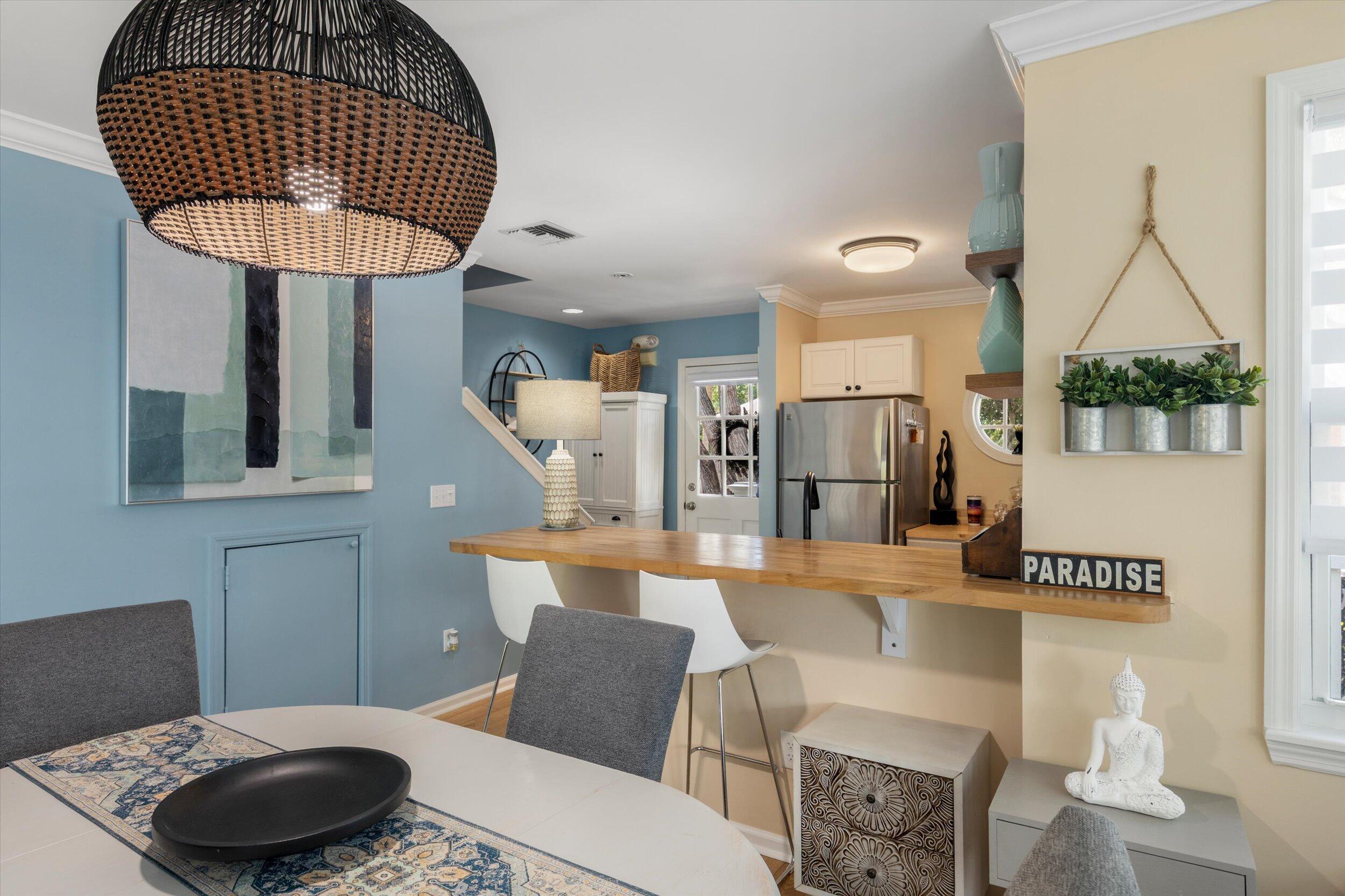 37 Spoonbill Way Key West, FL 33040 - Photo 16 of 88 a living room with furniture a rug and a chandelier