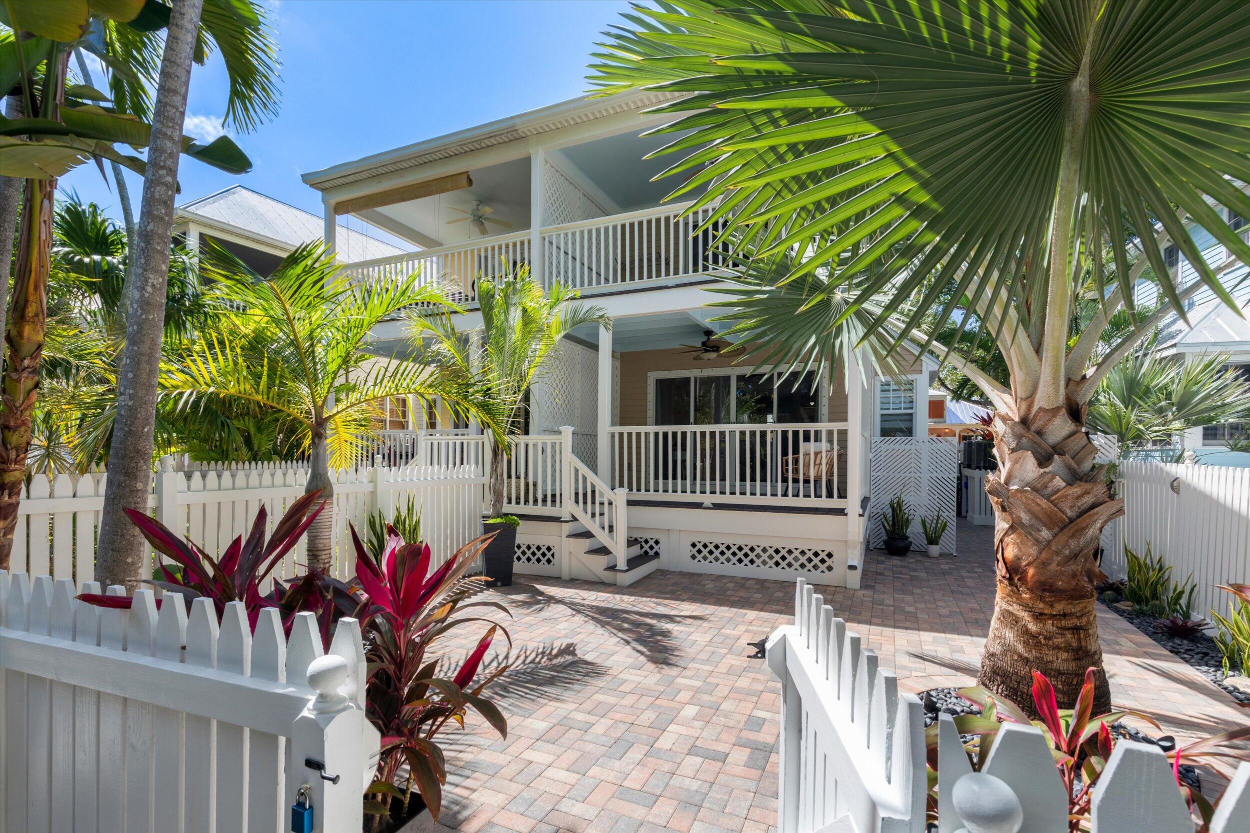 37 Spoonbill Way Key West, FL 33040 - Photo 25 of 88 a house with lots of trees in front of it