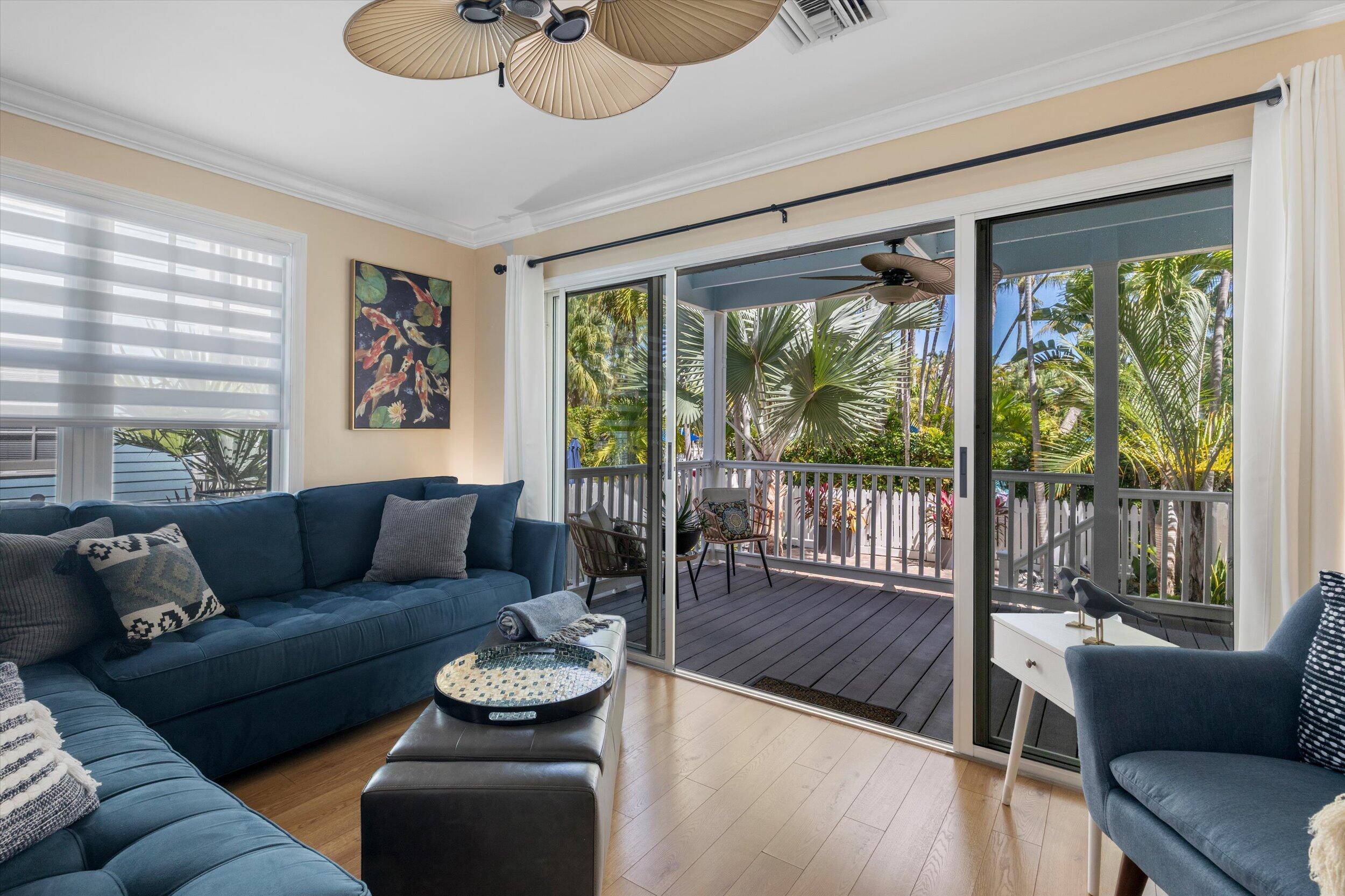 37 Spoonbill Way Key West, FL 33040 - Photo 33 of 88 a living room with furniture and a large window