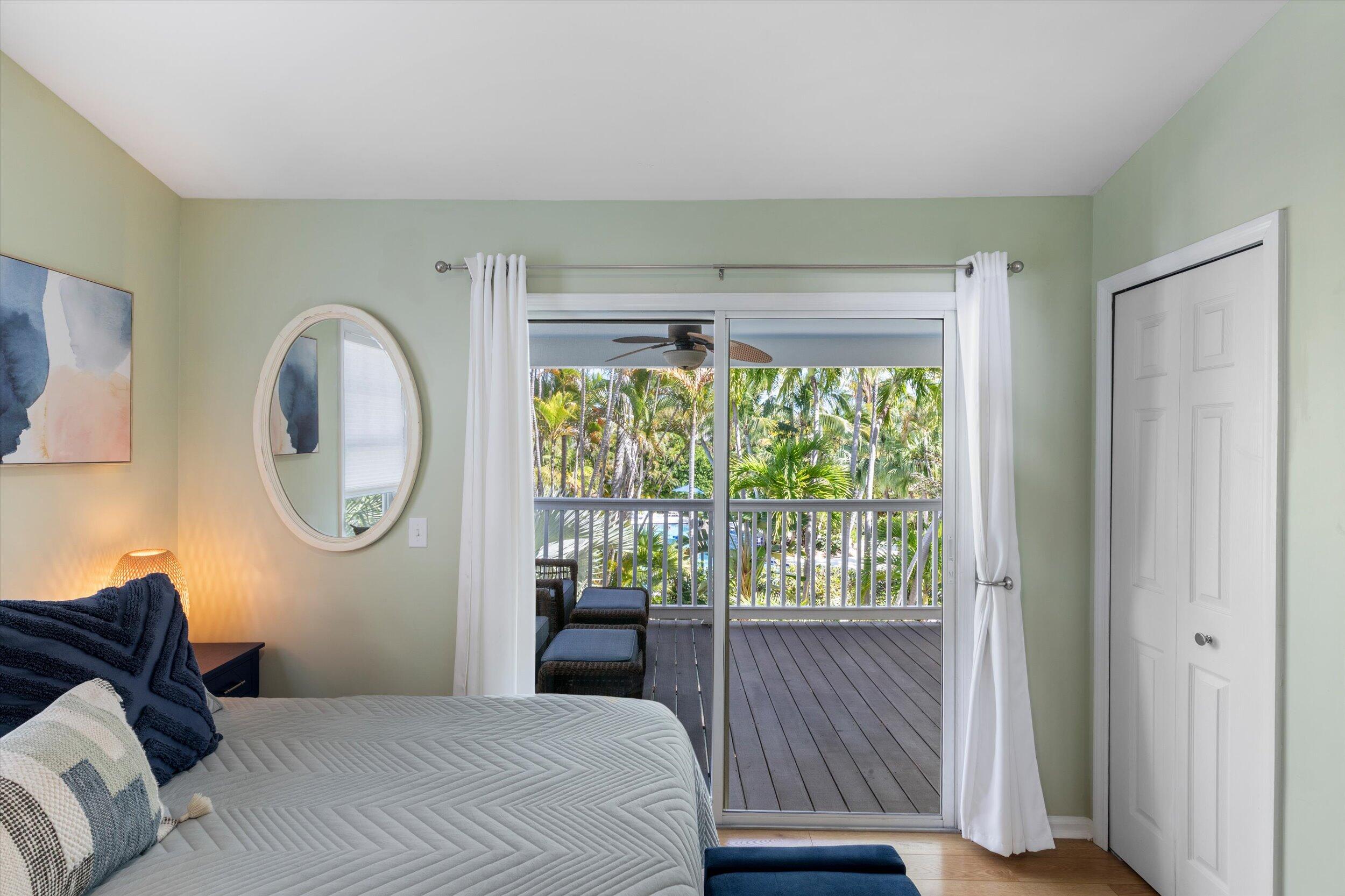 37 Spoonbill Way Key West, FL 33040 - Photo 41 of 88 a bedroom with a bed and a window