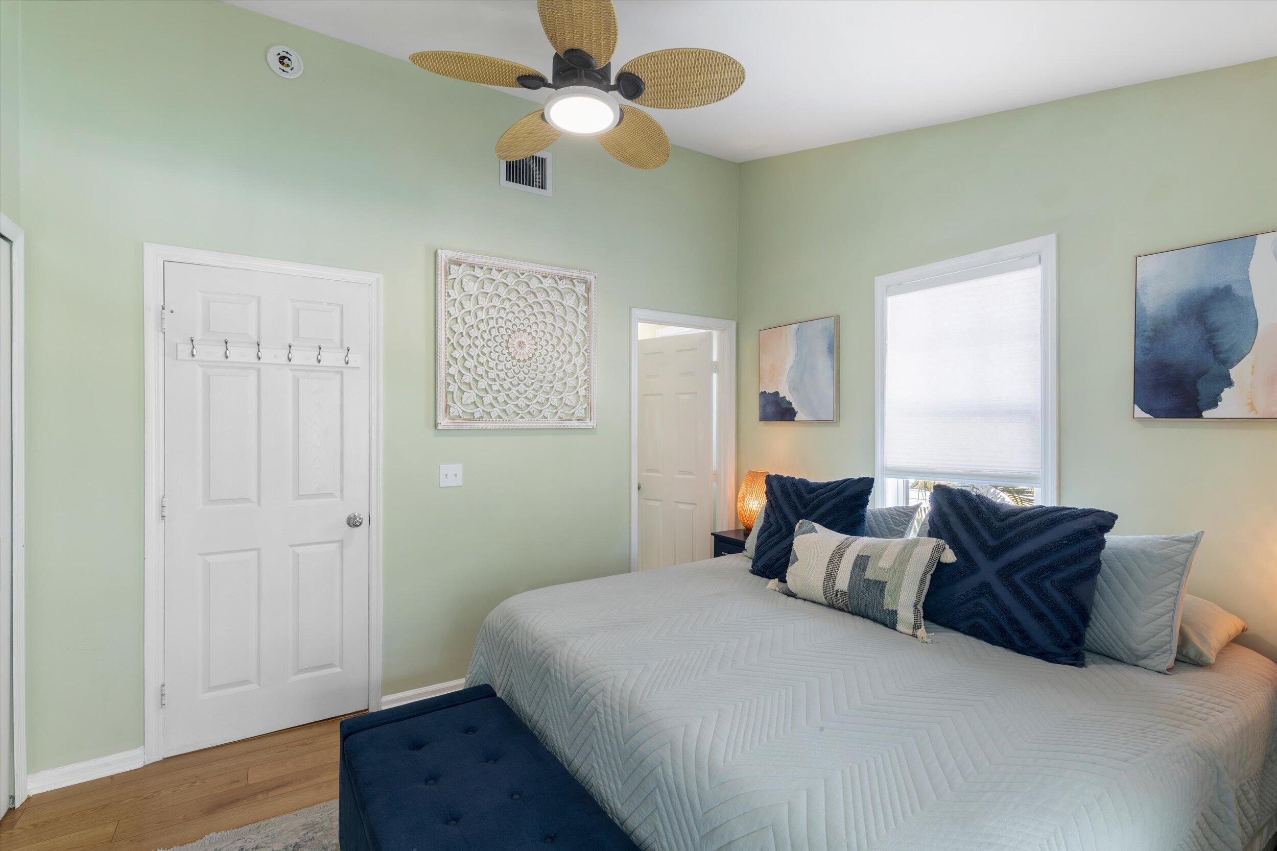 37 Spoonbill Way Key West, FL 33040 - Photo 43 of 88 a bedroom with a bed and wooden floor