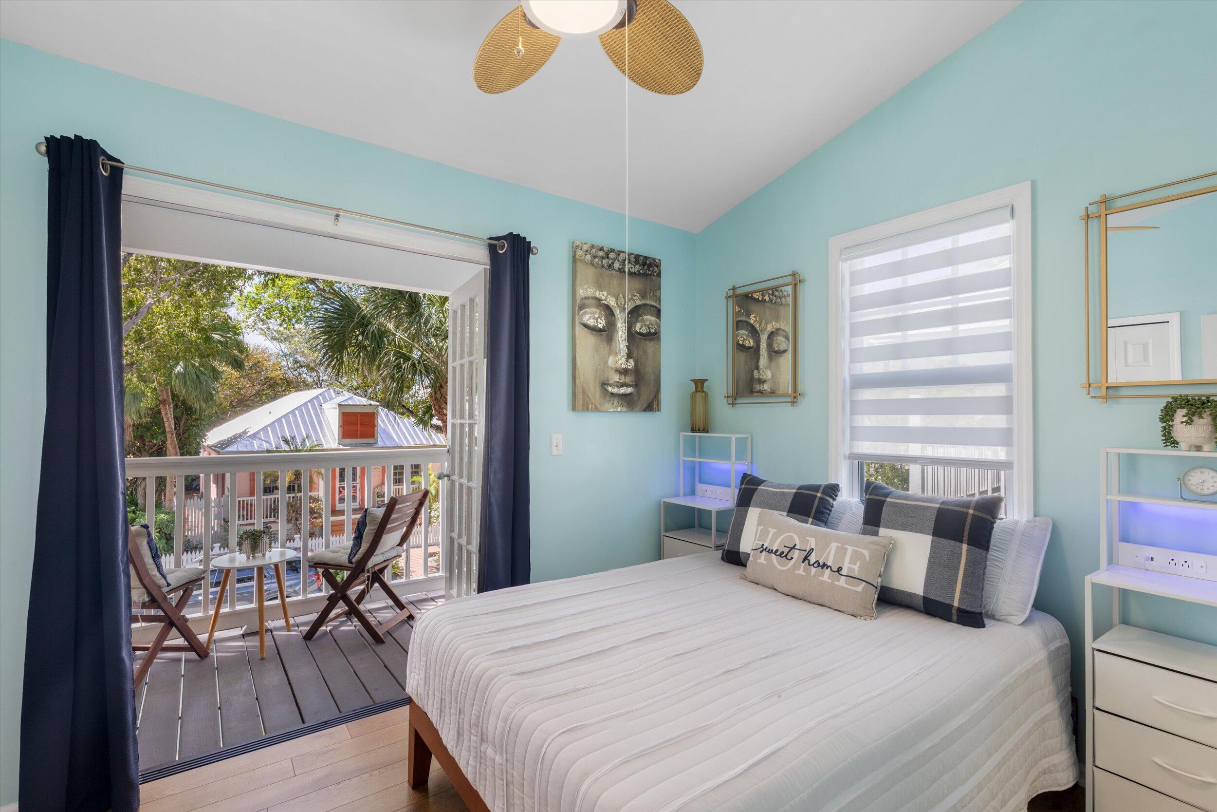 37 Spoonbill Way Key West, FL 33040 - Photo 51 of 88 a bedroom with a bed and a table