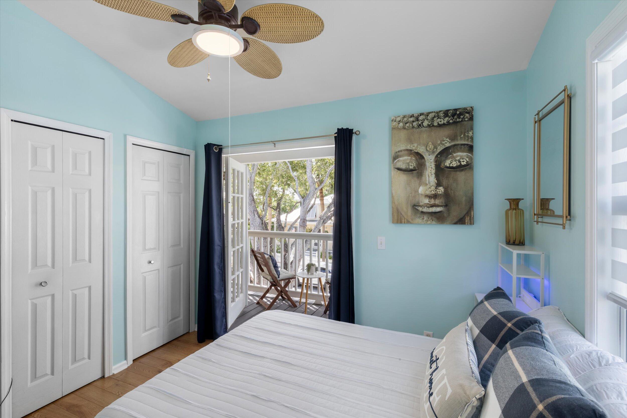 37 Spoonbill Way Key West, FL 33040 - Photo 52 of 88 a bedroom with a bed and a window