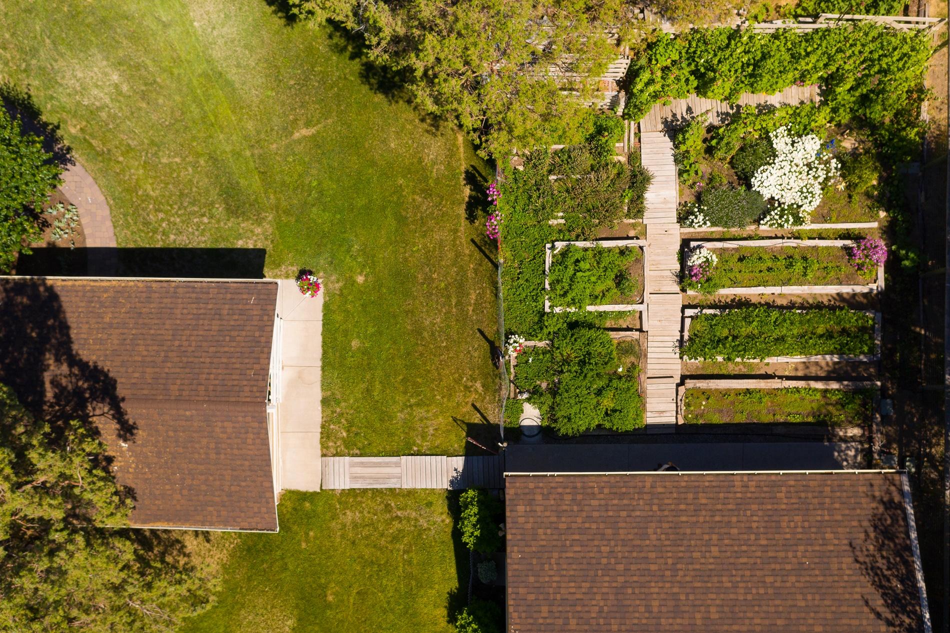 64980 Gerking Market Road Bend, OR 97703 - Photo 26 of 35 Aerial view of the 500SF studio space, veggie gardens, & garden shed/hay barn.
