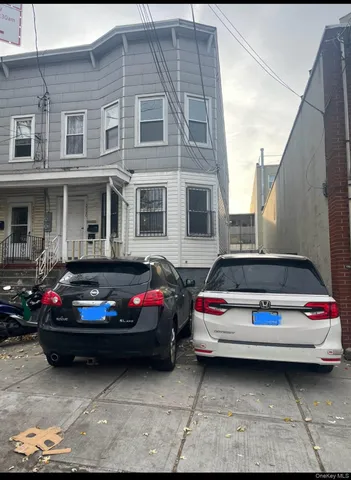 a car parked in front of a house