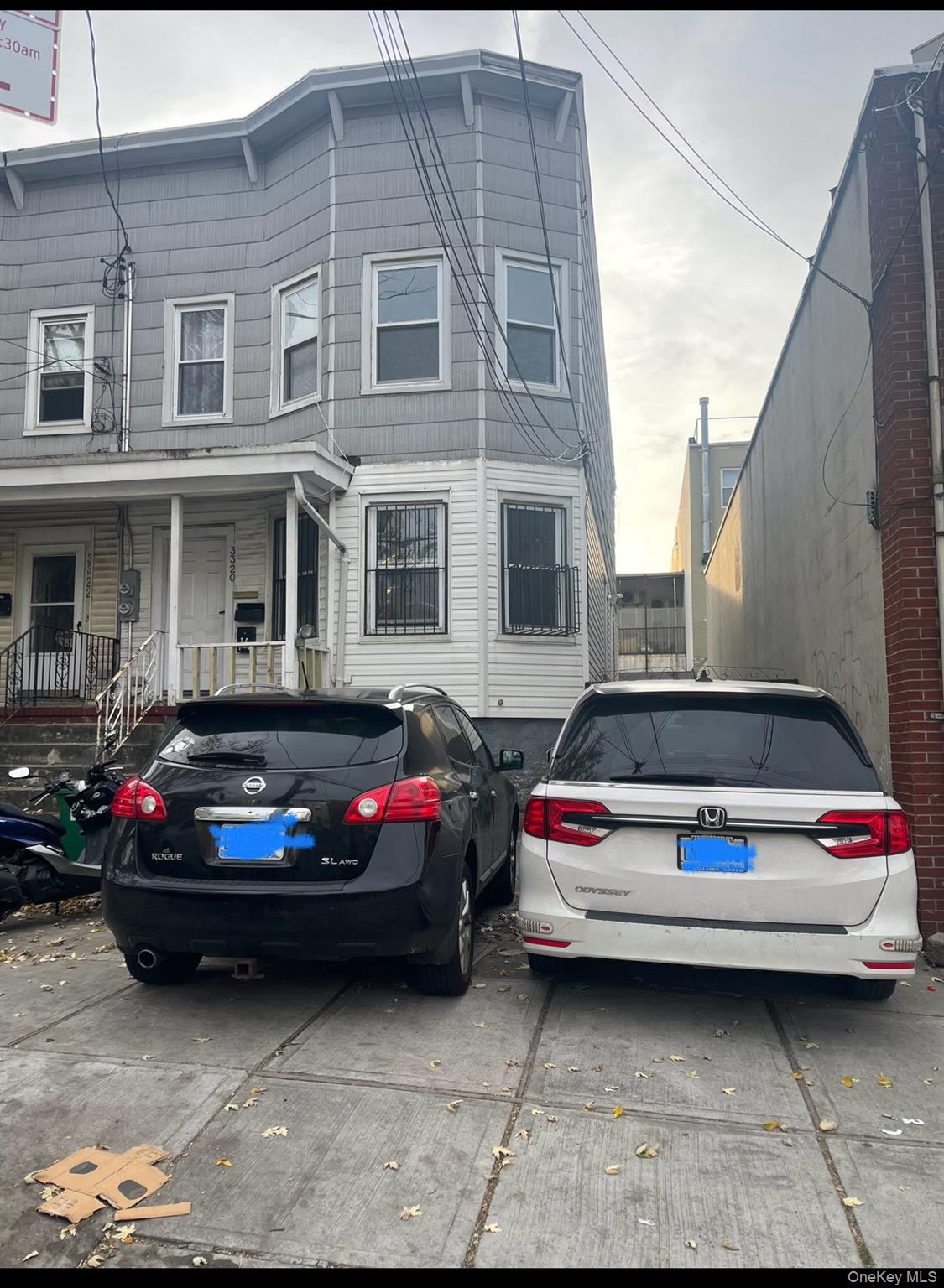 a car parked in front of a house