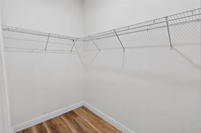 a view of a room with racks on the wall