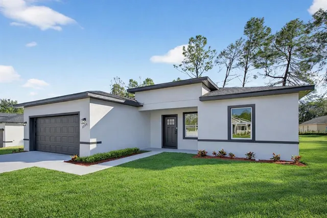 a front view of house with yard
