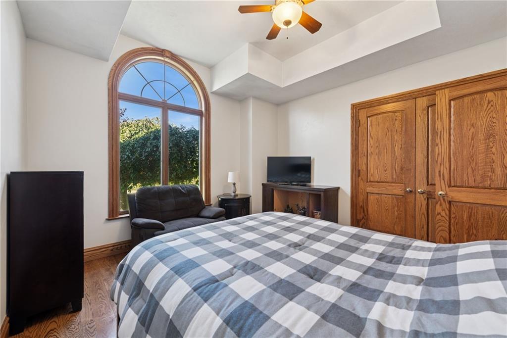 577 Bovard Luxor Road Luxor, PA 15662 - Photo 22 of 42 a bedroom with a large bed and a tv