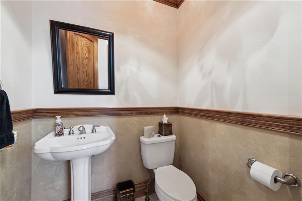 577 Bovard Luxor Road Luxor, PA 15662 - Photo 24 of 42 a bathroom with a toilet a sink and mirror