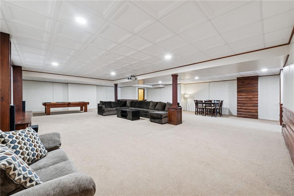 577 Bovard Luxor Road Luxor, PA 15662 - Photo 26 of 42 a living room with furniture and a large window