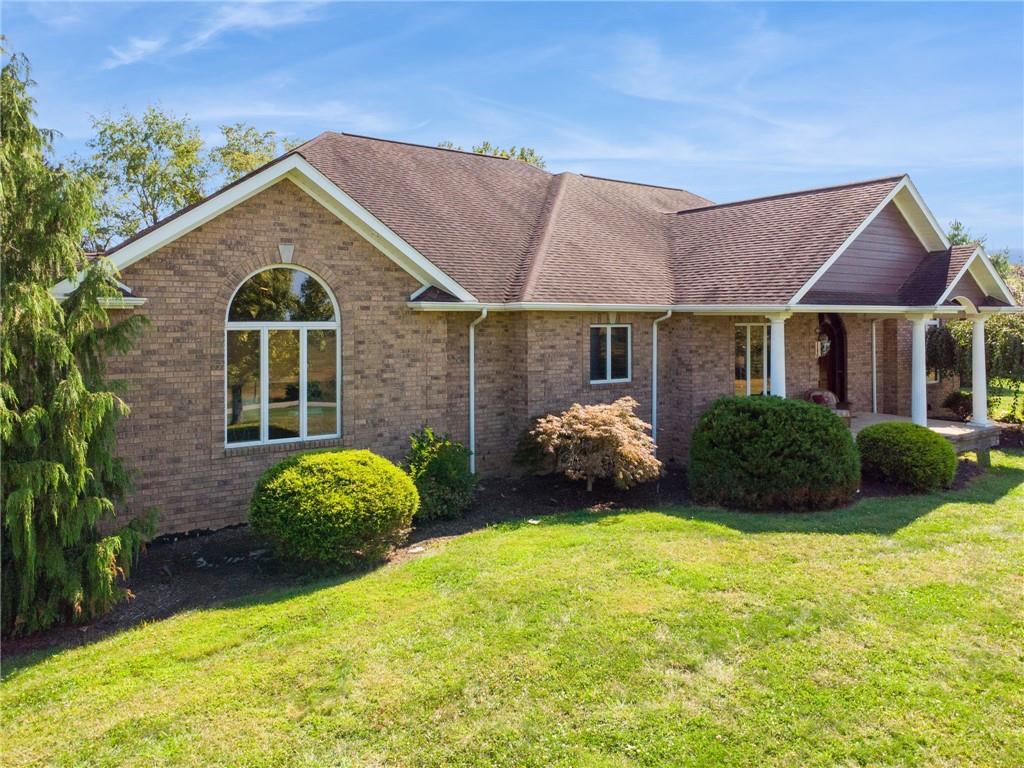 577 Bovard Luxor Road Luxor, PA 15662 - Photo 36 of 42 a view of a big house with a big yard and potted plants