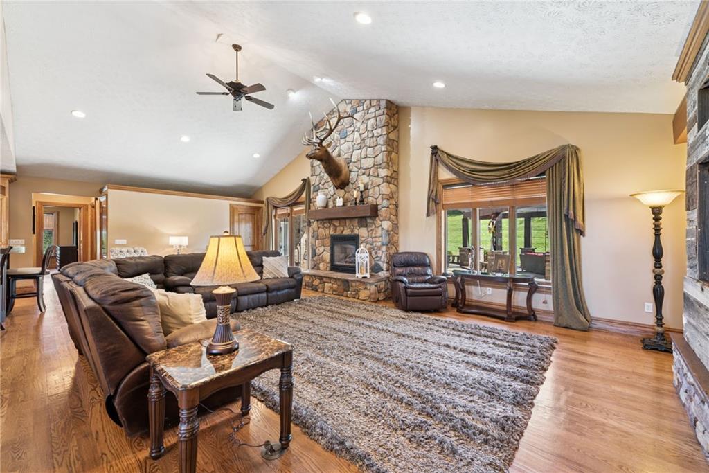 577 Bovard Luxor Road Luxor, PA 15662 - Photo 4 of 42 a living room with furniture and a fireplace
