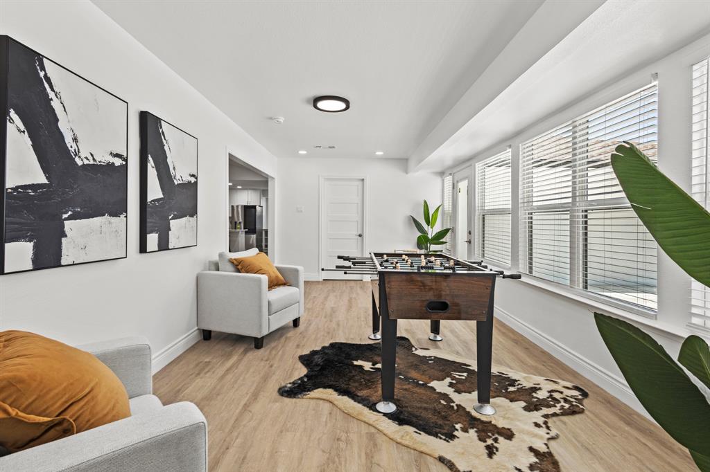 4105 Candlenut Lane Dallas, TX 75244 - Photo 12 of 27 a living room with furniture and wooden floor