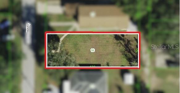 14306 1st Street Dade City, FL 33525 - Photo 2 of 9 a view of a wooden fence