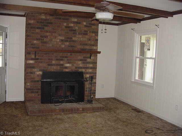 2783 Westfield Road Mount Airy, NC 27030 - Photo 4 of 9 Other. Livingroom w/woodstove remaining.