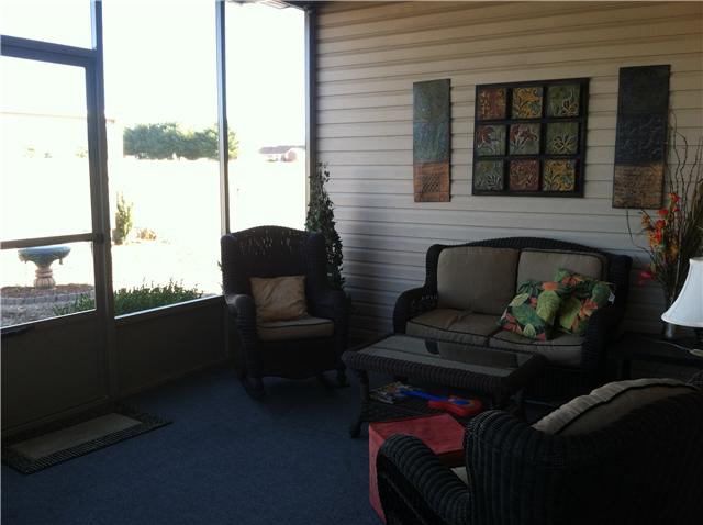 455 Clearview Road Cottontown, TN 37048 - Photo 9 of 20 Seasonal square footage in peaceful screened-in patio overlooking private back yard that is landscaped.