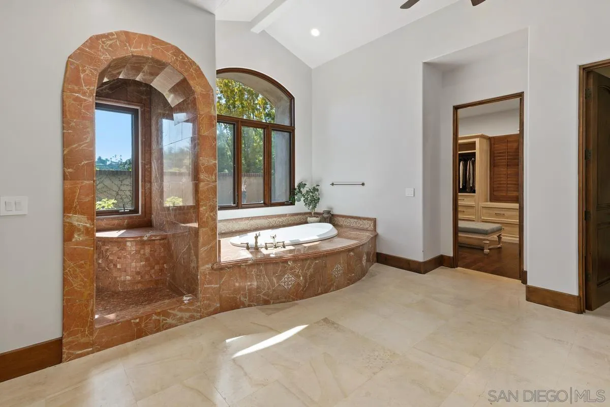 14778 El Rodeo Court Rancho Santa Fe, CA 92067 - Photo 14 of 28 a view of spacious bathroom with bathtub and shower