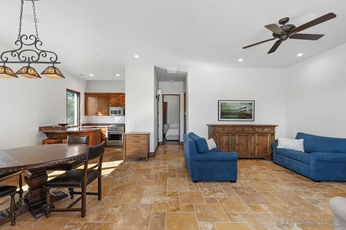 14778 El Rodeo Court Rancho Santa Fe, CA 92067 - Photo 19 of 28 a living room with furniture and a wooden floor