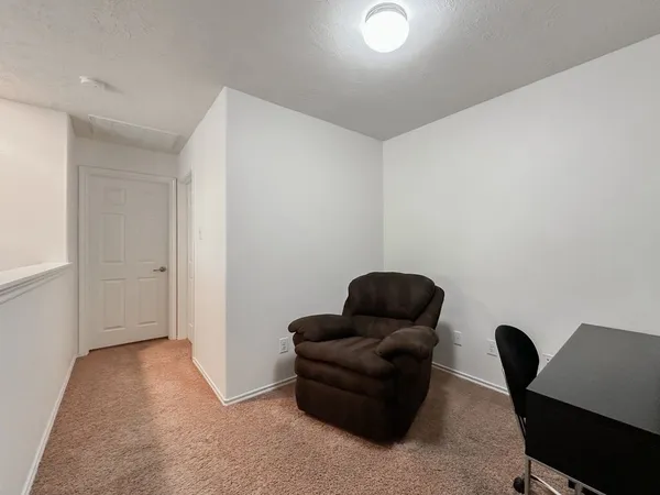 a livingroom with furniture and a couch