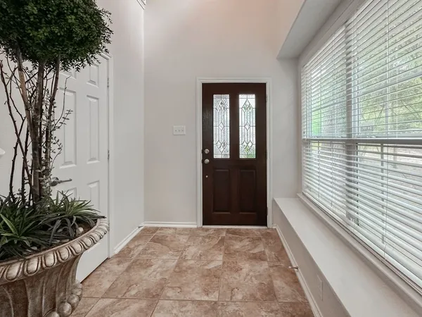a view of a entryway door of the house
