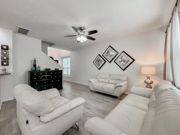 a living room with furniture and a couch