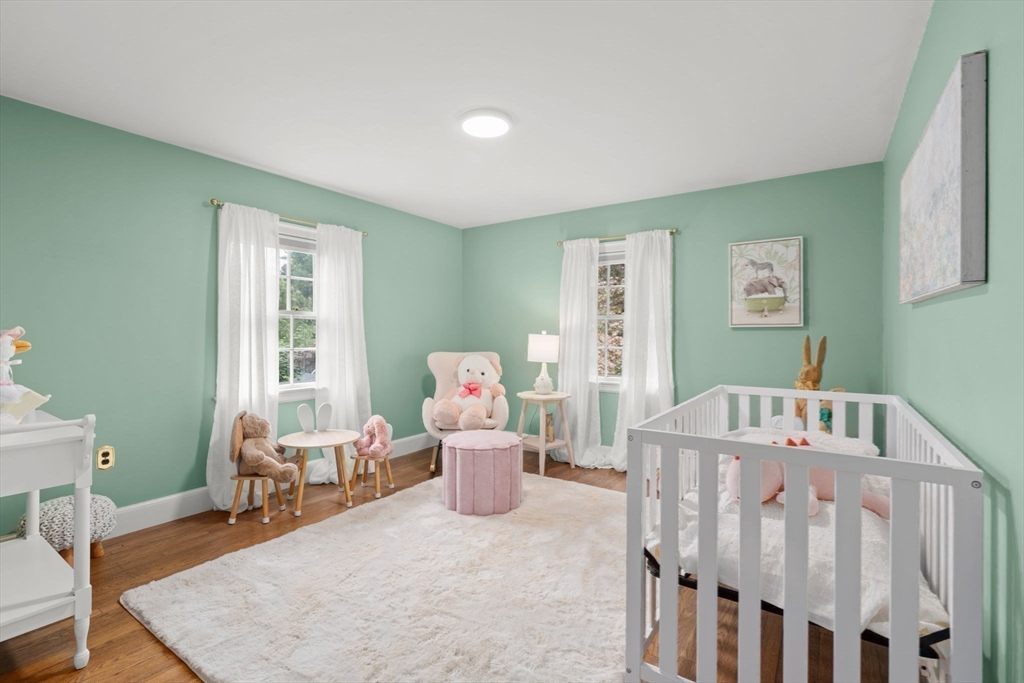 16 Bailey Lane Dedham, MA 02026 - Photo 24 of 40 a bed room with furniture and a window