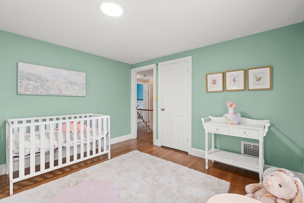 16 Bailey Lane Dedham, MA 02026 - Photo 25 of 40 a bedroom with furniture and a window