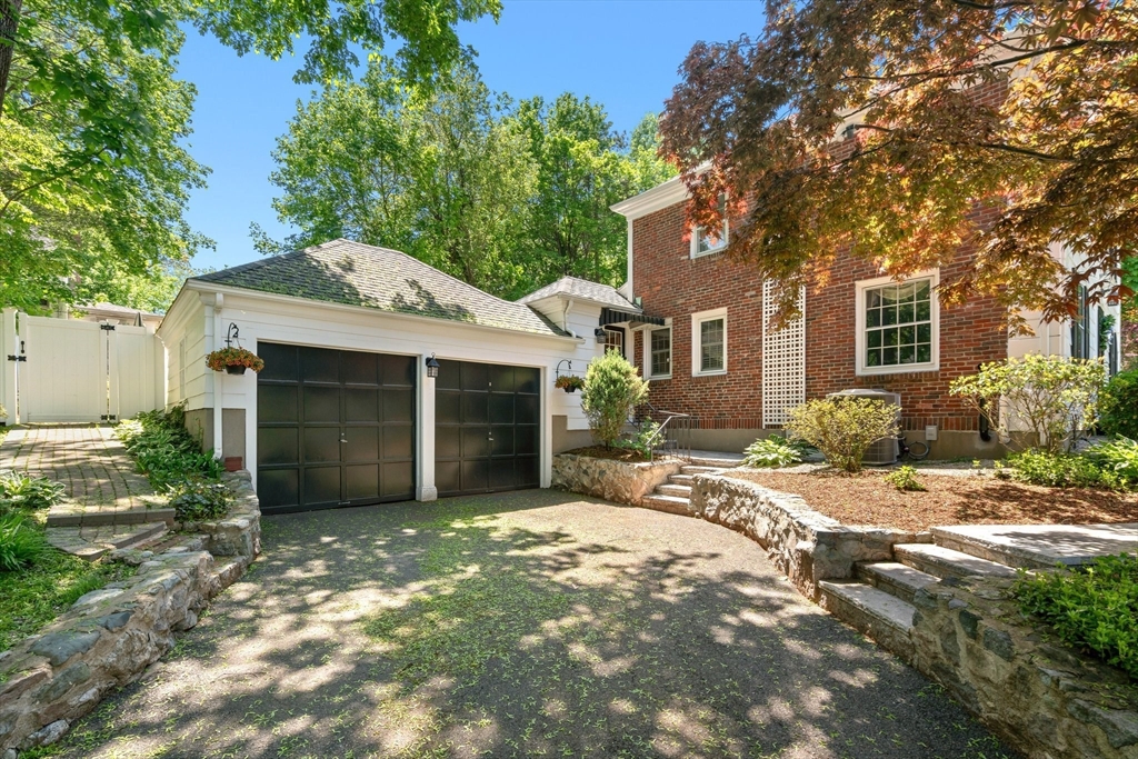 16 Bailey Lane Dedham, MA 02026 - Photo 3 of 40 a front view of a house with a yard