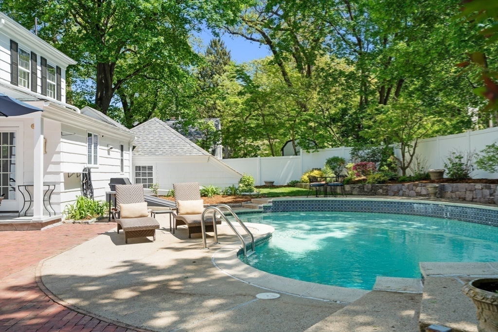 16 Bailey Lane Dedham, MA 02026 - Photo 36 of 40 a view of swimming pool with lawn chairs and plants