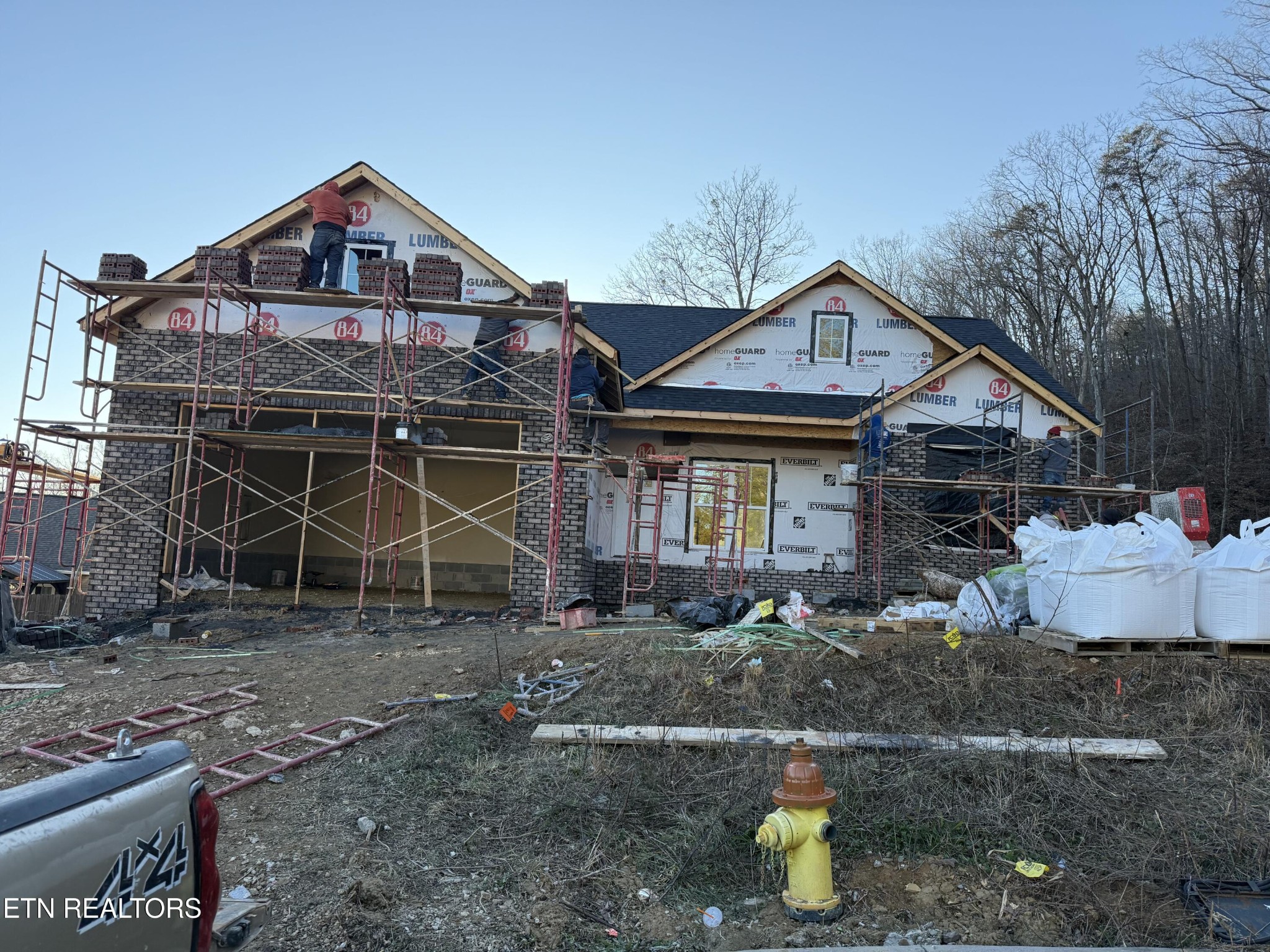 a front view of a house with parking area