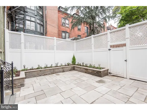 a view of a terrace with a bench