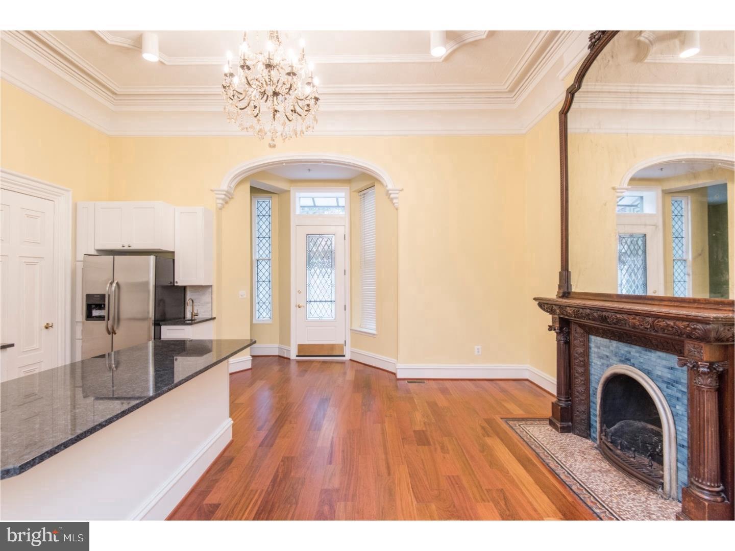 2129 Walnut Street, Unit 1 Philadelphia, PA 19103 - Photo 7 of 7 a view of a hallway with a washer and dryer