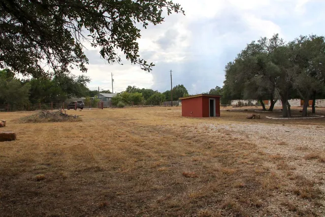 a view of open space with trees