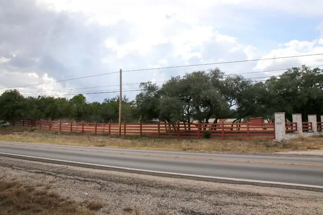 a view of a town with mountains in the background