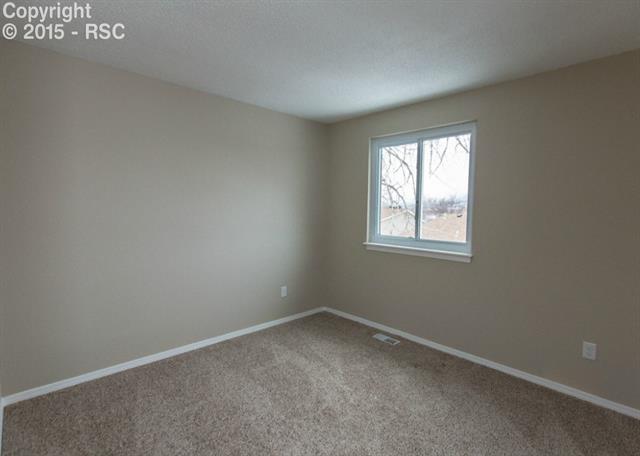 1730 Doherty Road Colorado Springs, CO 80916 - Photo 23 of 32 Bedroom #2 is on the upper level