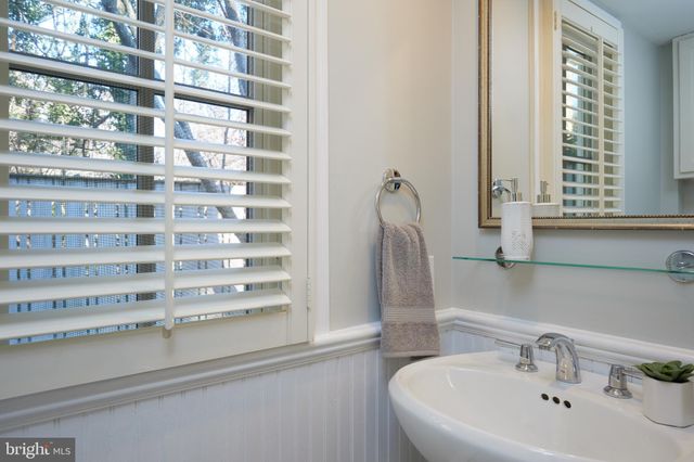 a bathroom with a sink and a shower