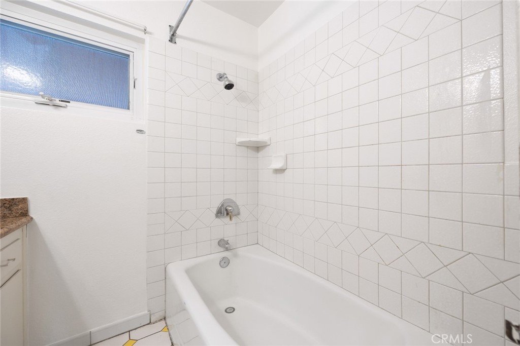 101 Hampden Terrace Alhambra, CA 91801 - Photo 24 of 46 a bathroom with a bathtub