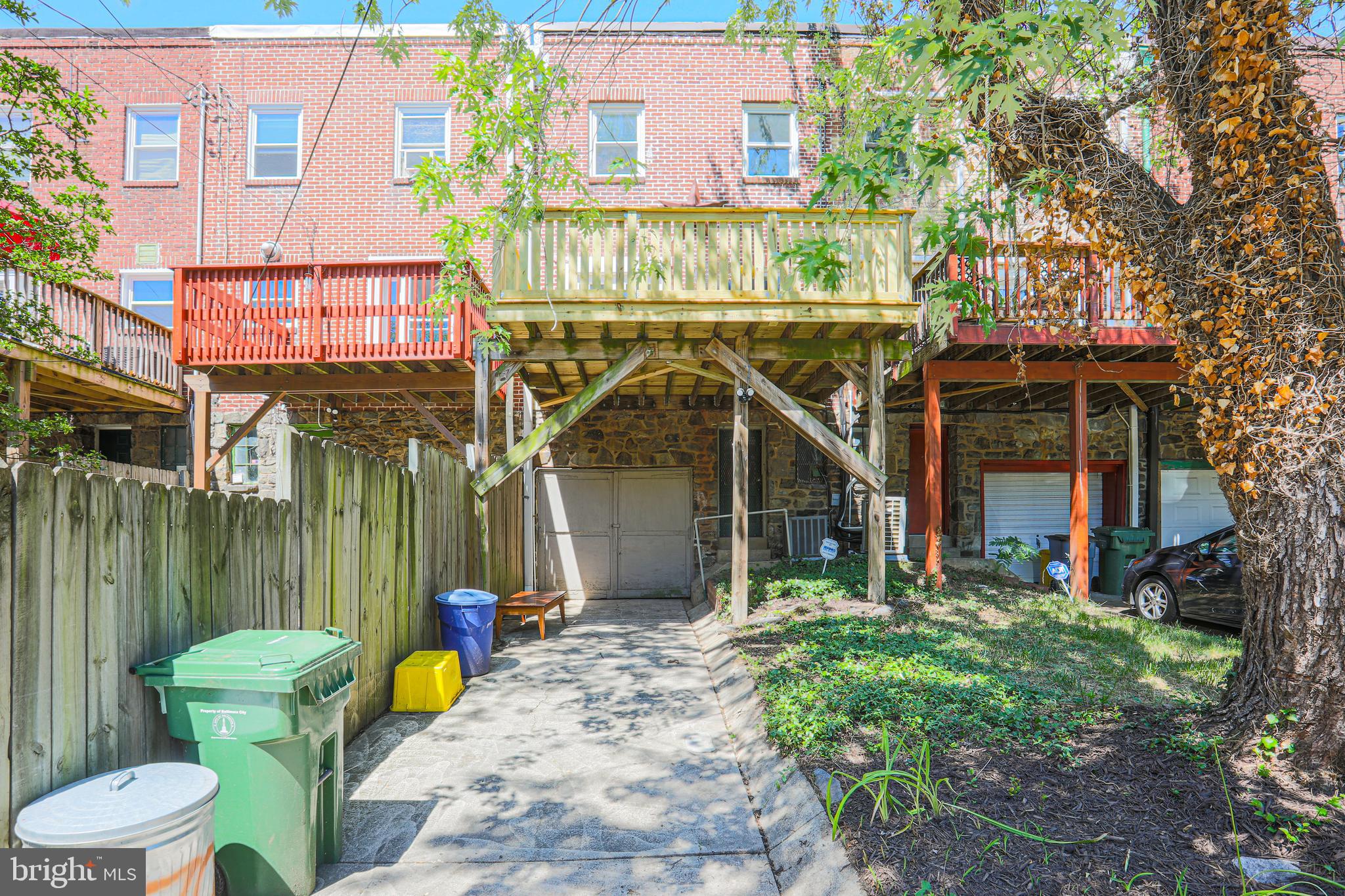 3707 Elkader Road Baltimore, MD 21218 - Photo 50 of 50 Garage and parking with view of large deck