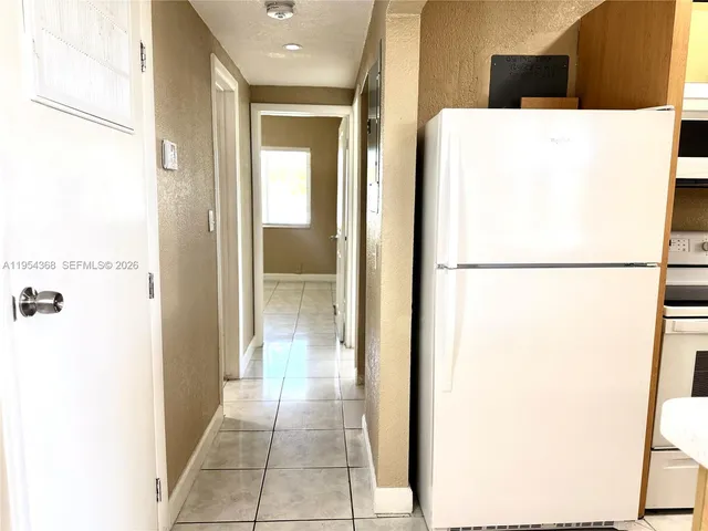 a view of a room with windows