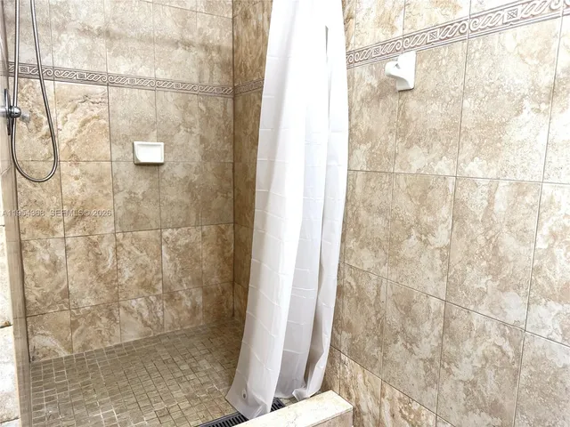 a view of a balcony with street view