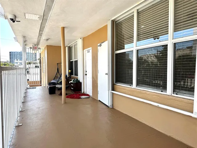 a view of a balcony with an outdoor space