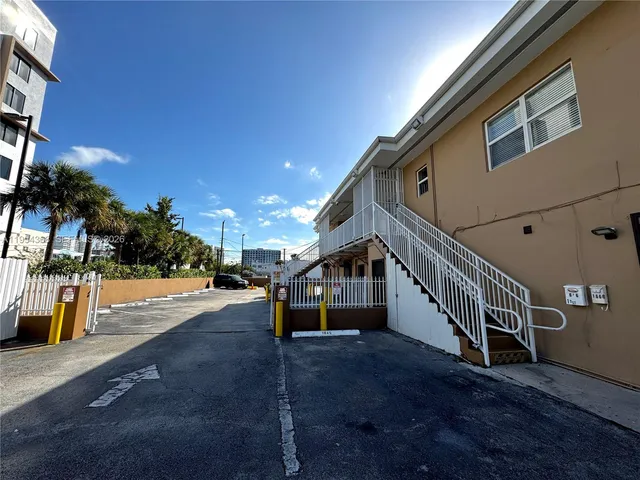 a view of a house with a street