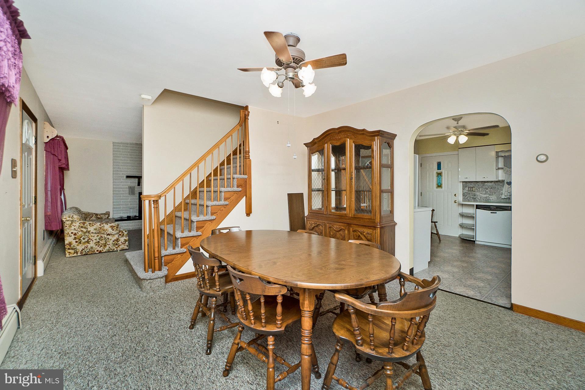 2627 Welshtown Road Slatington, PA 18080 - Photo 11 of 32 a dining room with furniture and a chandelier