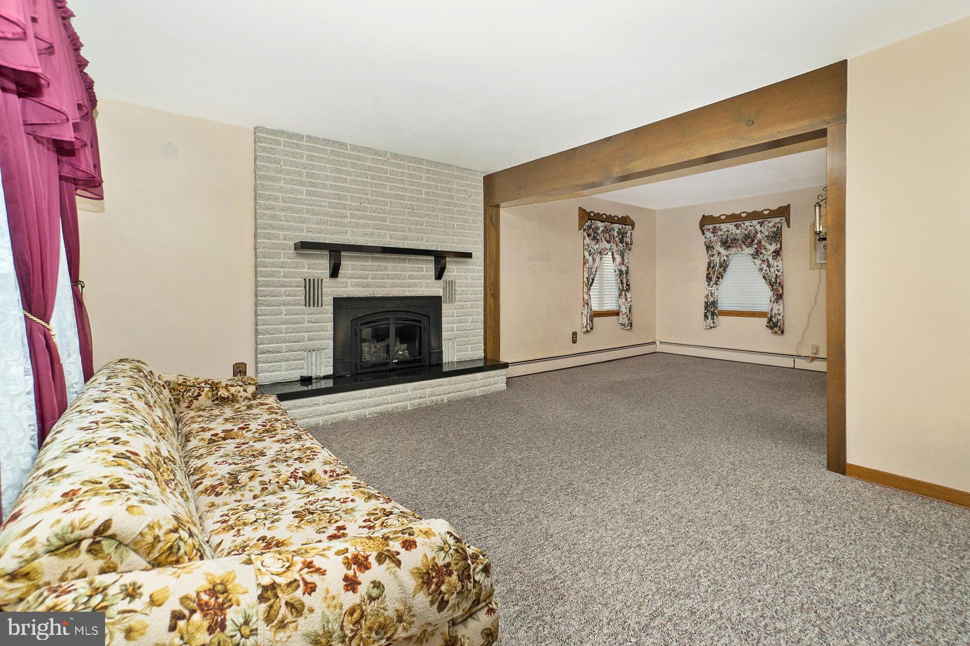 2627 Welshtown Road Slatington, PA 18080 - Photo 13 of 32 a view of a livingroom with a fireplace