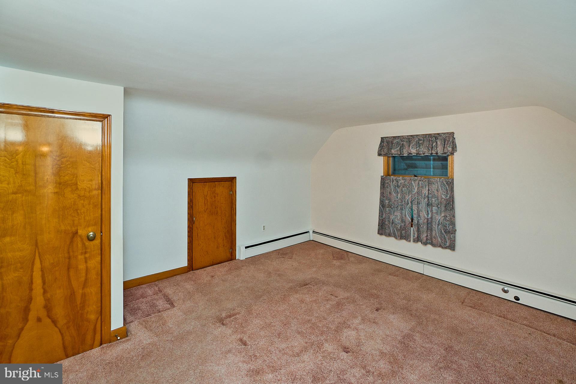 2627 Welshtown Road Slatington, PA 18080 - Photo 23 of 32 an empty room with windows